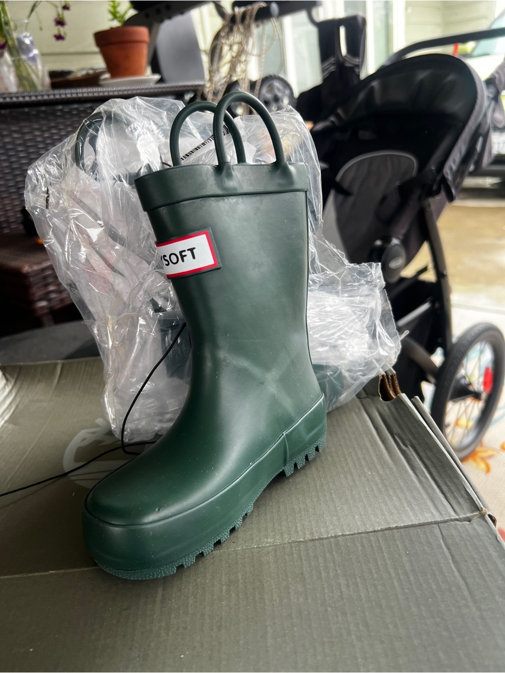 Brand new toddler Green Rain Boot with Pull Handles. Size 7.